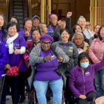 A large group of Marin County IHSS members and allies in front of the Marin County Building