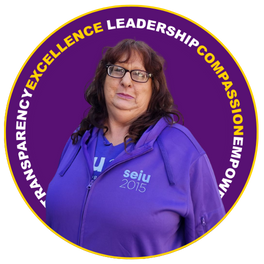Tracy Hammond smiling, wearing a purple SEIU 2015 jacket