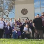 Tehama IHSS workers wear purple SEIU 2015 shirts in front of Tehama County Administration Building